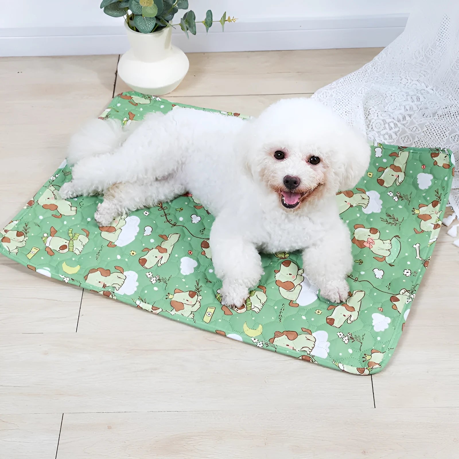 Washable waterproof pet urine pad in animal world pattern showing cloth surface and non-slip backing