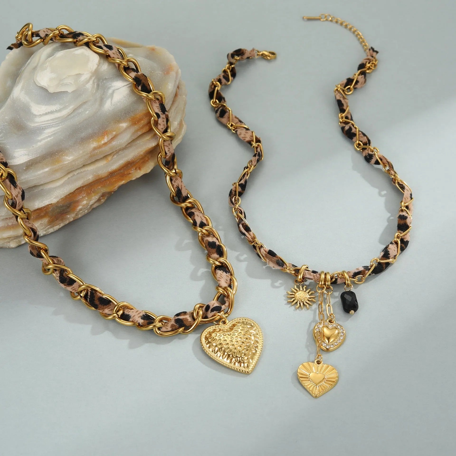 Stainless steel leopard love pendant necklace with geometric design and 18K gold electroplating on adjustable chain