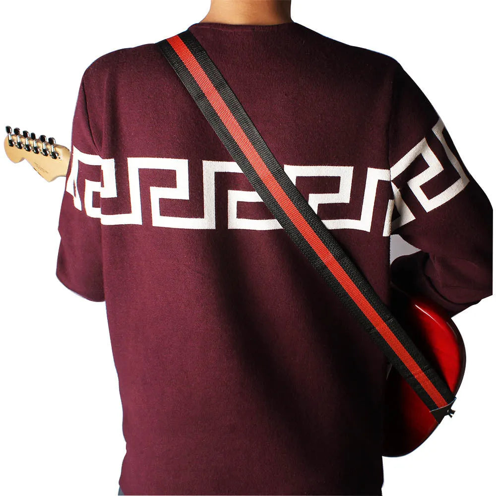 Woven crossbody instrument strap with leather shoulder pad for guitar bass ukulele