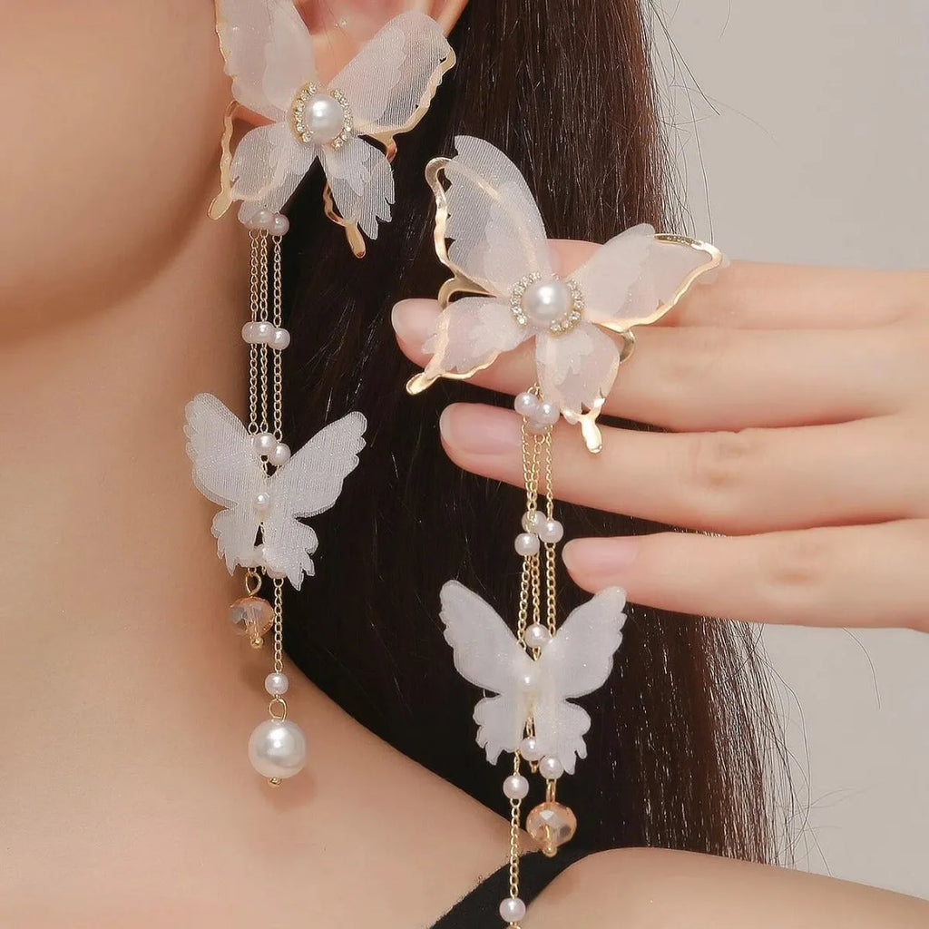 Butterfly tassel lace pearl rhinestone earrings with white electroplated finish
