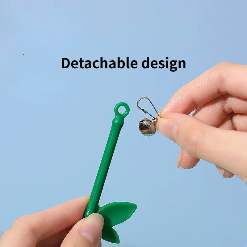 Green interactive cat wand toy with feather and bell refills for feline play
