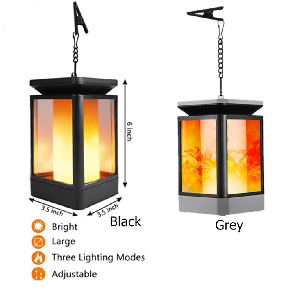Black antique flame design solar street lamp for gardens with solar panel on top.