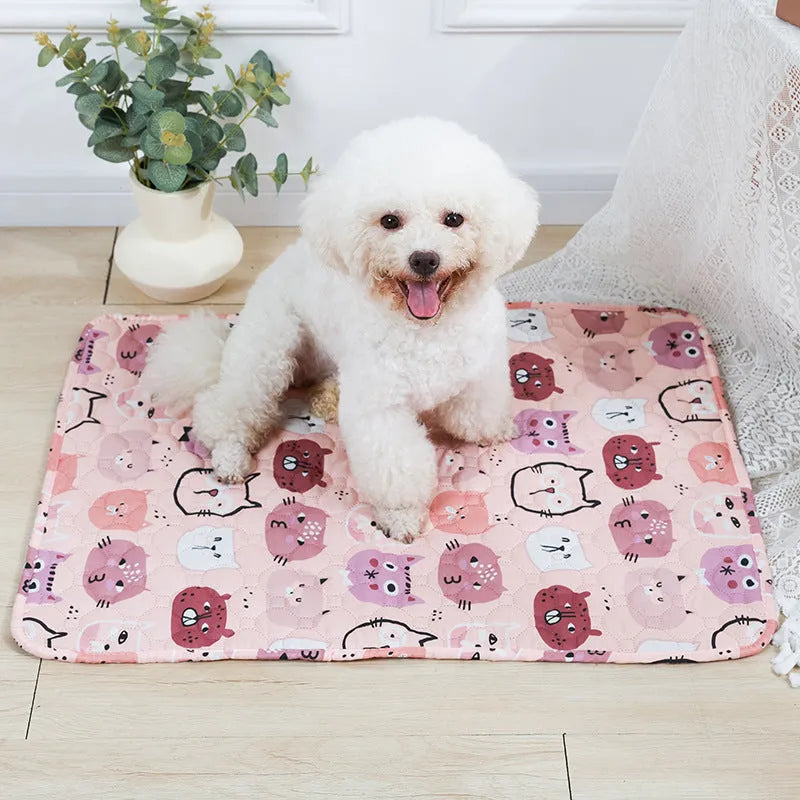 Washable waterproof pet urine pad in animal world pattern showing cloth surface and non-slip backing