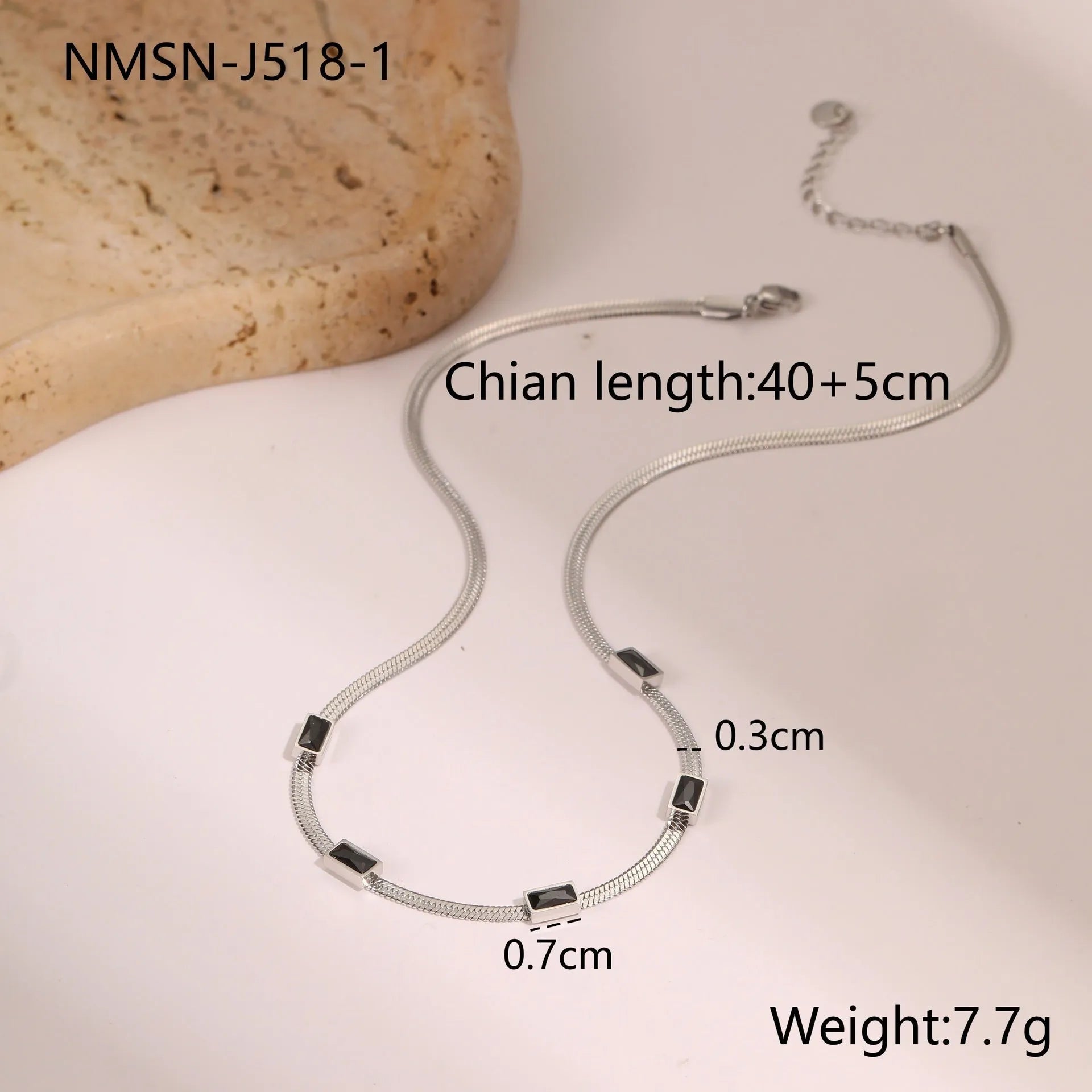 Stainless steel geometric square zircon necklace on a flat snake chain in gold or steel colour.