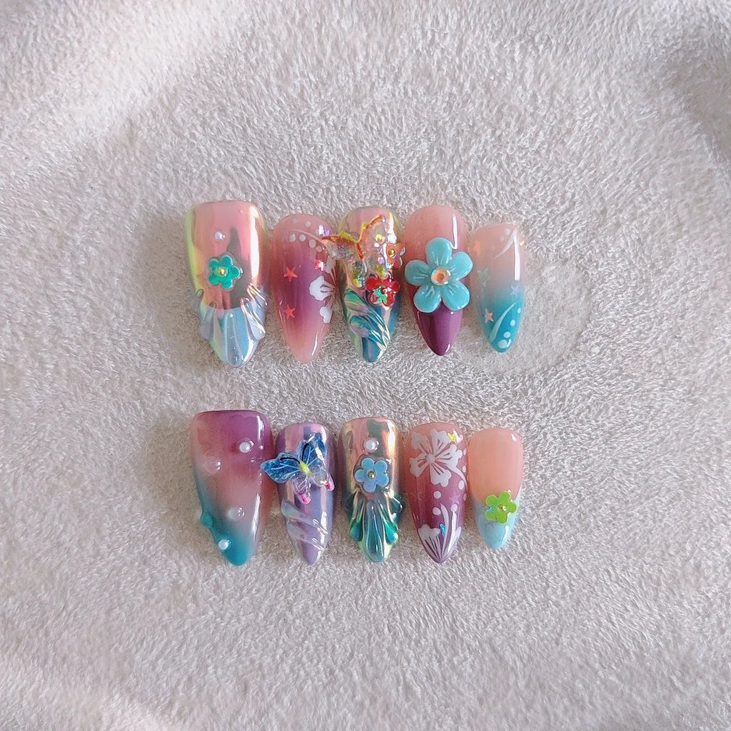 Handmade colourful floral and butterfly nail decorations set with embossed patterns in four sizes