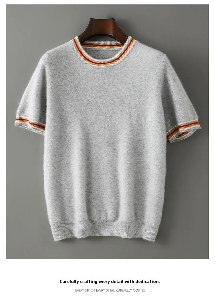Men's short sleeve pure wool sweater in grey, showing round neck and pullover style on a middle-aged model.