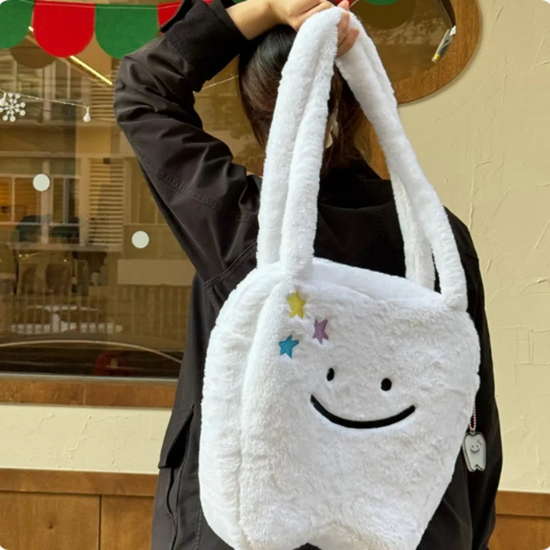 White plush shoulder tote bag with cute teeth design and zipper closure