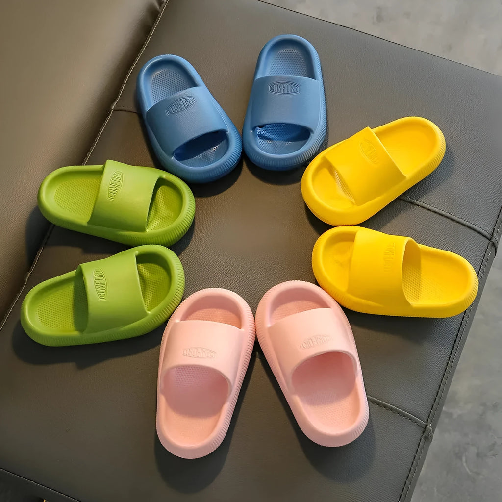 Children's EVA slippers in bright colours with non-slip soles showing size range options