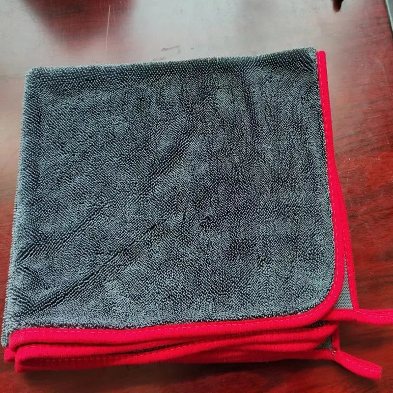 Grey braided twist car cleaning towel with red edge, shown in multiple sizes for vehicle washing