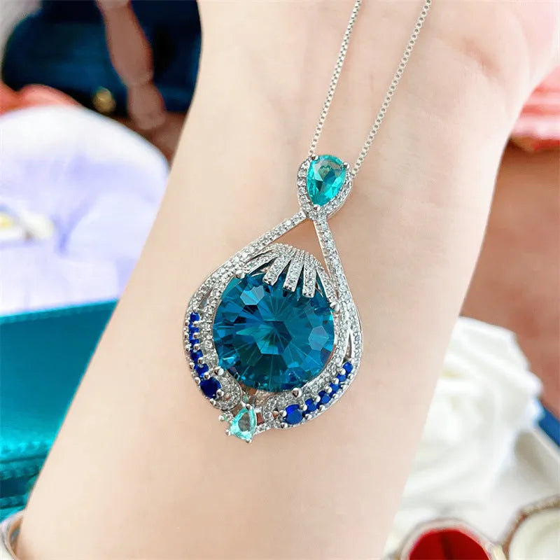 Blue crystal fireworks cut geometric pendant necklace on water wave chain for women