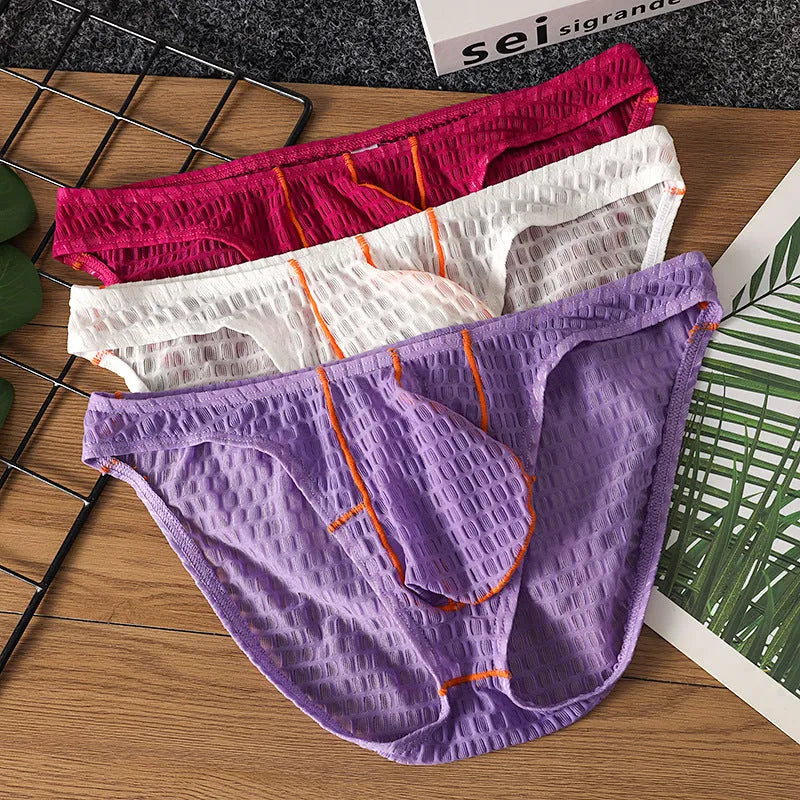 Men's low waist lace briefs in white, black, green, red, and light purple on a size chart.