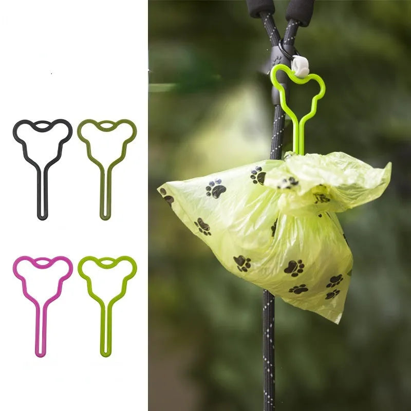 A durable dog poo bag holder with a black Velcro strap, shown attached to a dog lead.