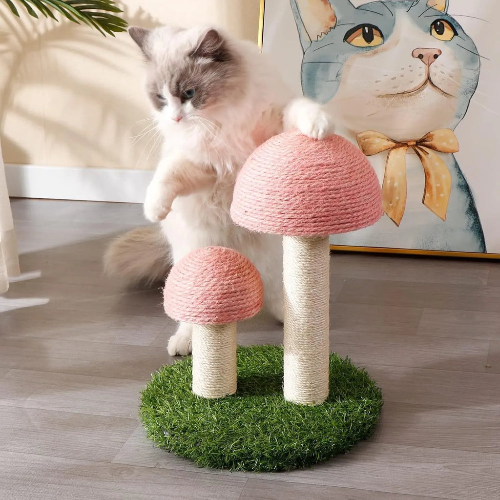 Pink mushroom-shaped cat scratching post with sisal-covered caps and pole for kittens.