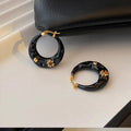 Retro Hong Kong style alloy ear studs with rhinestone inlay in black and red colour options