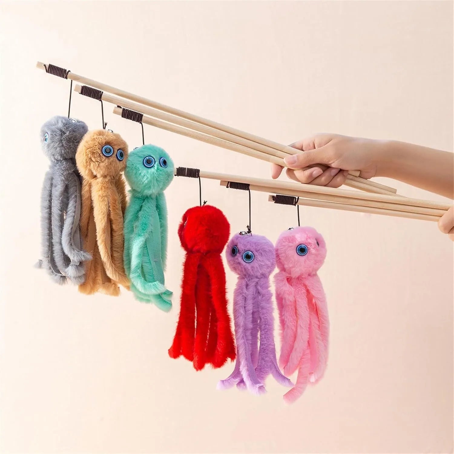 Brightly coloured cat octopus toy with long stick wand for interactive play with indoor cats