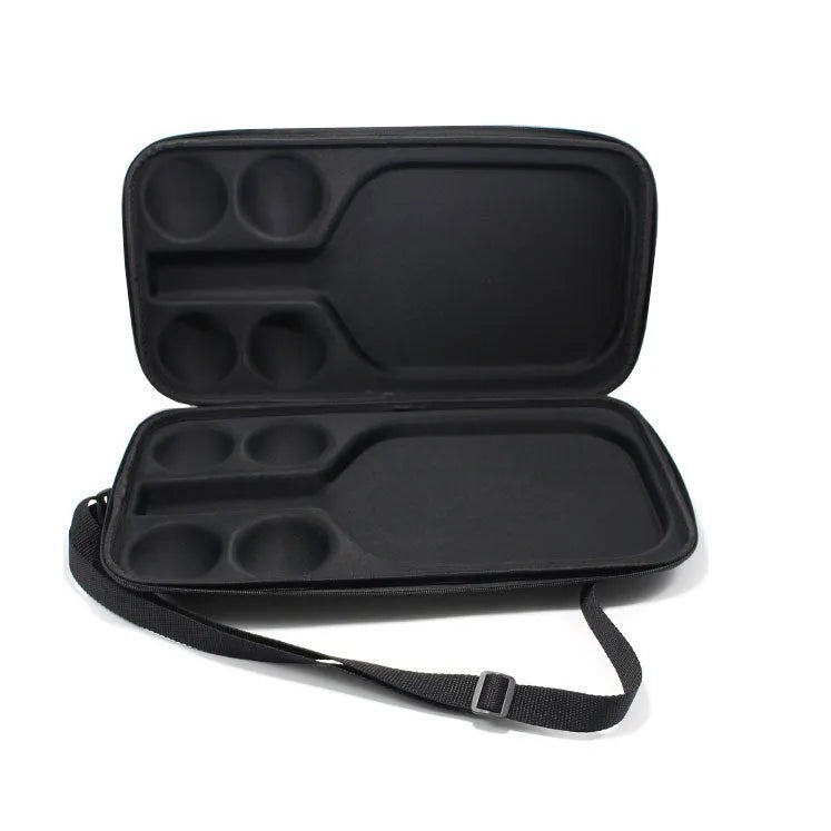 Black EVA pickleball storage bag with double shoulder straps, shown with a paddle and balls.
