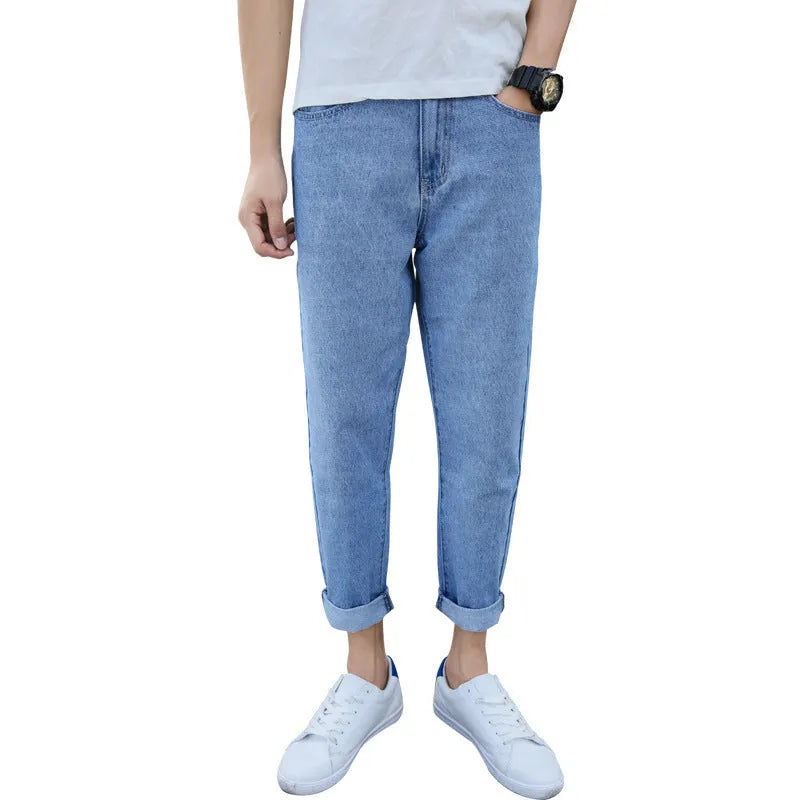 Men's black straight-leg jeans with loose fit and light straight leg opening on hanger