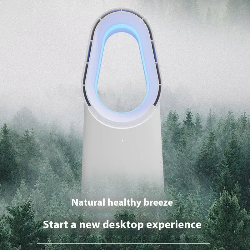 White bladeless tower fan with a remote control and touch screen panel on a desk.