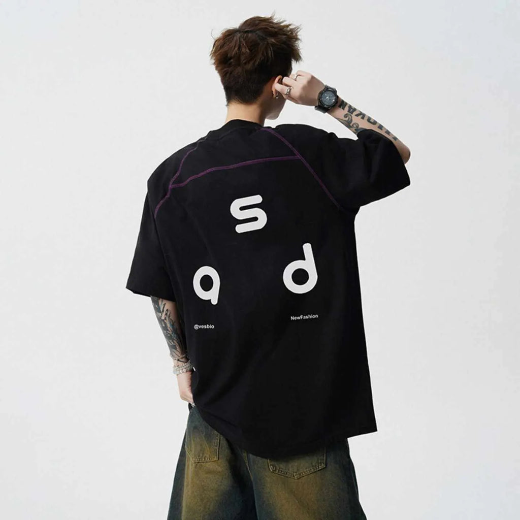 Loose fit cotton short sleeve t-shirt with letter print, shown in black and white colour options.