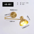 Modern minimalist double-section rocker arm wall lamp with metal finish and adjustable joints for bedroom lighting