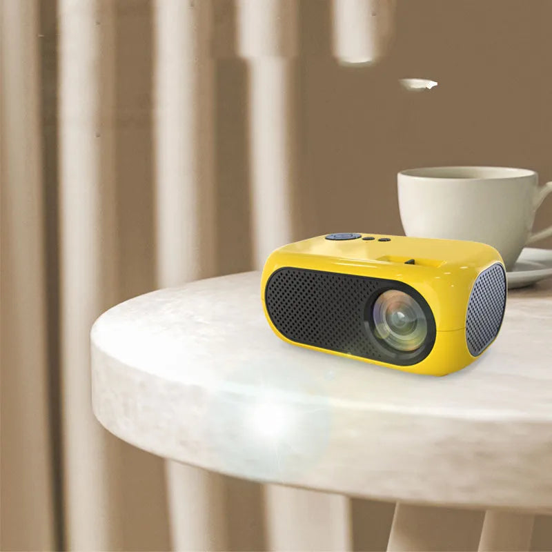 M24 micro mini portable LED projector in gold or white with compact ABS plastic build