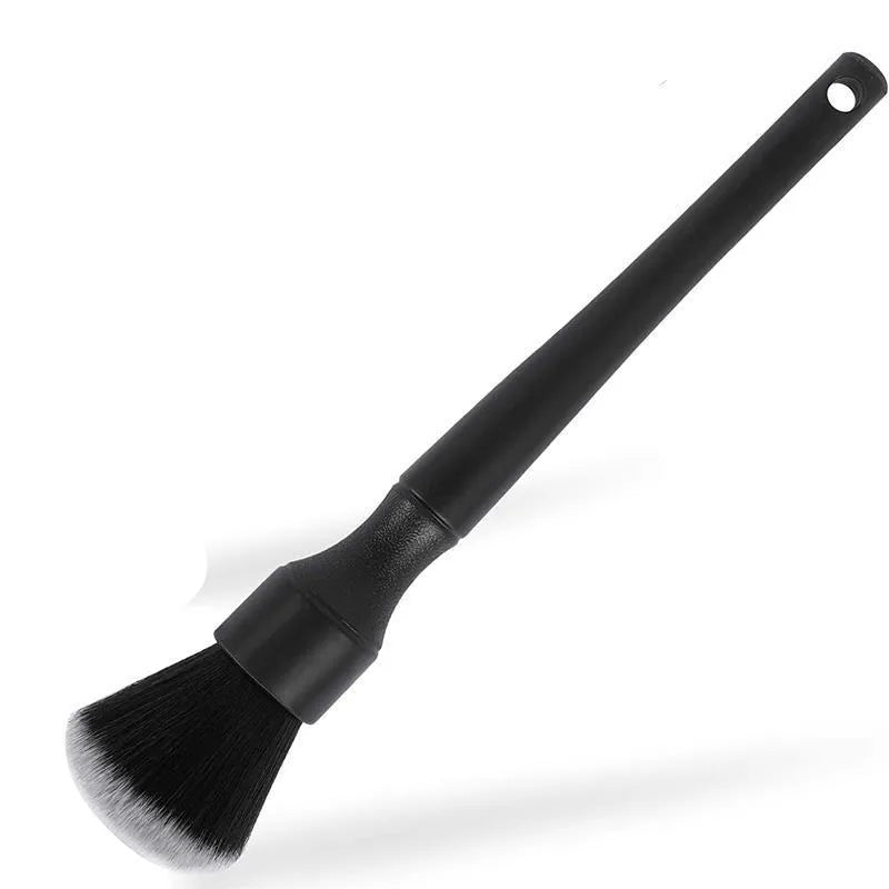 Black car detailing brush with ultra-soft pig hair bristles and a PP plastic handle for interior cleaning.