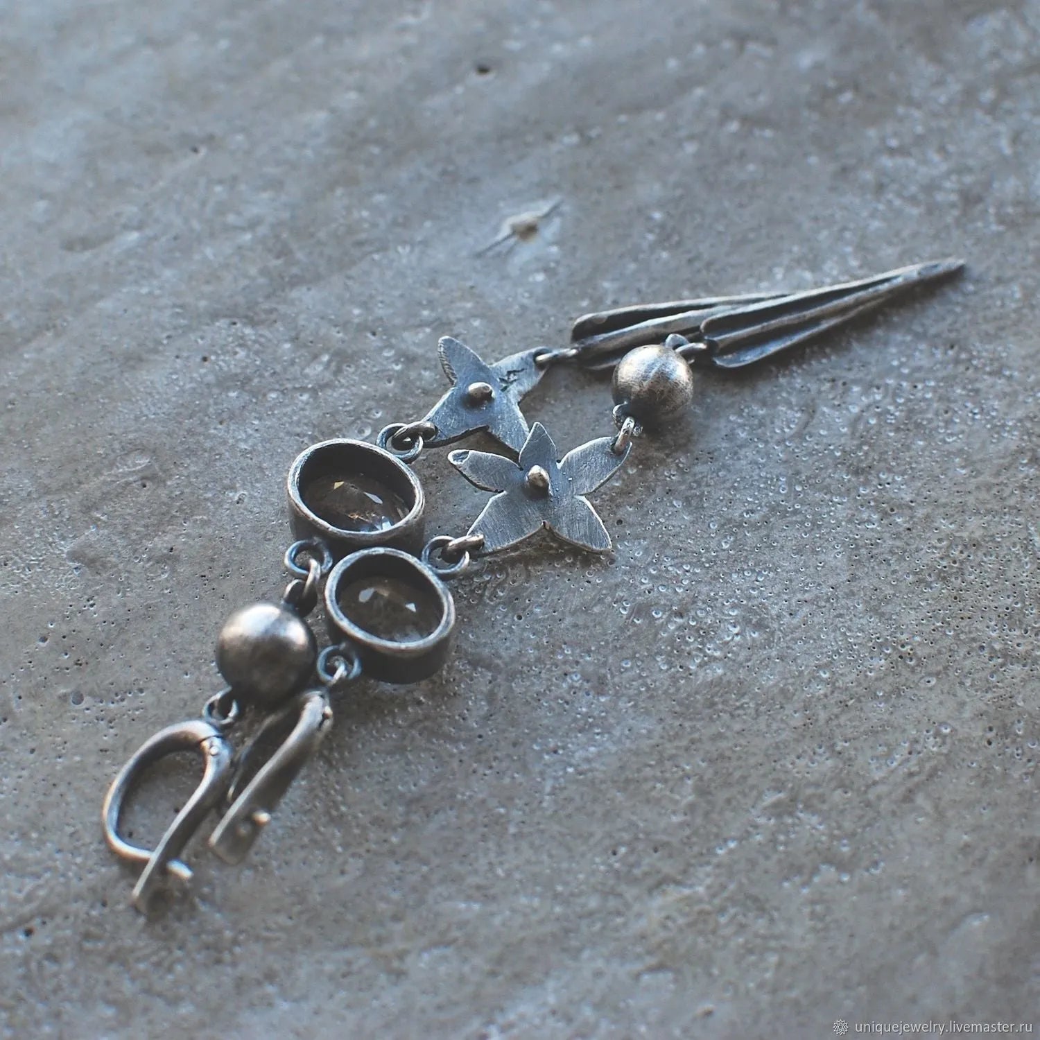 Geometric antique silver long pendant earrings with XINGX design and rhinestone details
