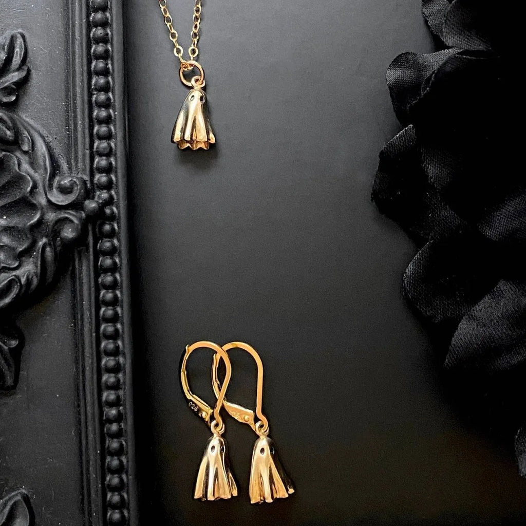Ghost pendant necklace on a stainless steel chain with choice of cable, Figaro, or mini staple style.
