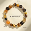 Women's natural style yellow tower crystal bead bracelet with 10mm Jinba large beads on wrist