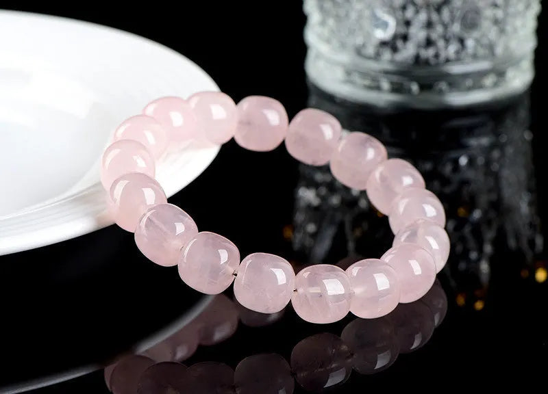 Natural bamboo crystal barrel bead bracelet with geometric design and pink colour