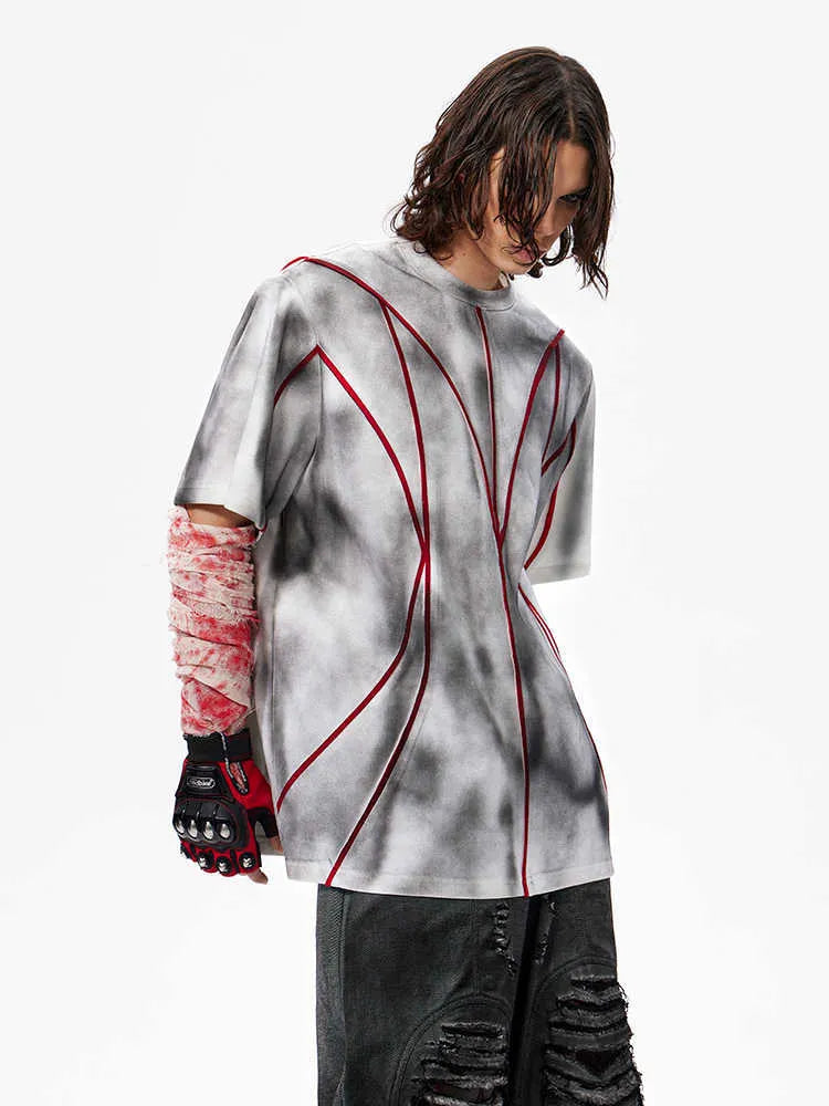 Women's padded shoulder t-shirt with textured patchwork design on short sleeves and round neck