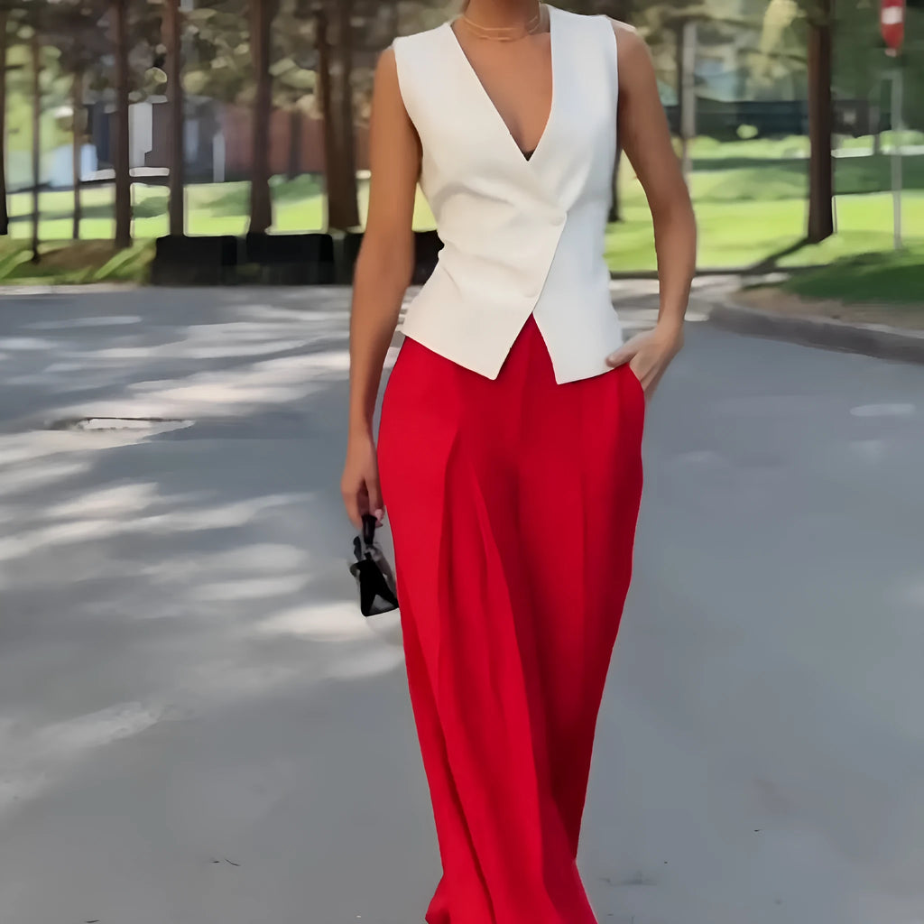 Women's beige two-piece set with deep V-neck sleeveless top and high-waist wide-leg trousers