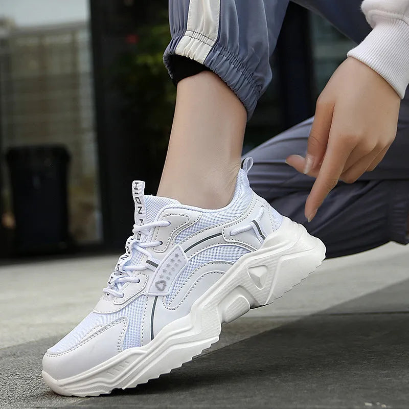 White women's casual sports shoes with mesh upper, PU sole, round toe, and ankle buckle.