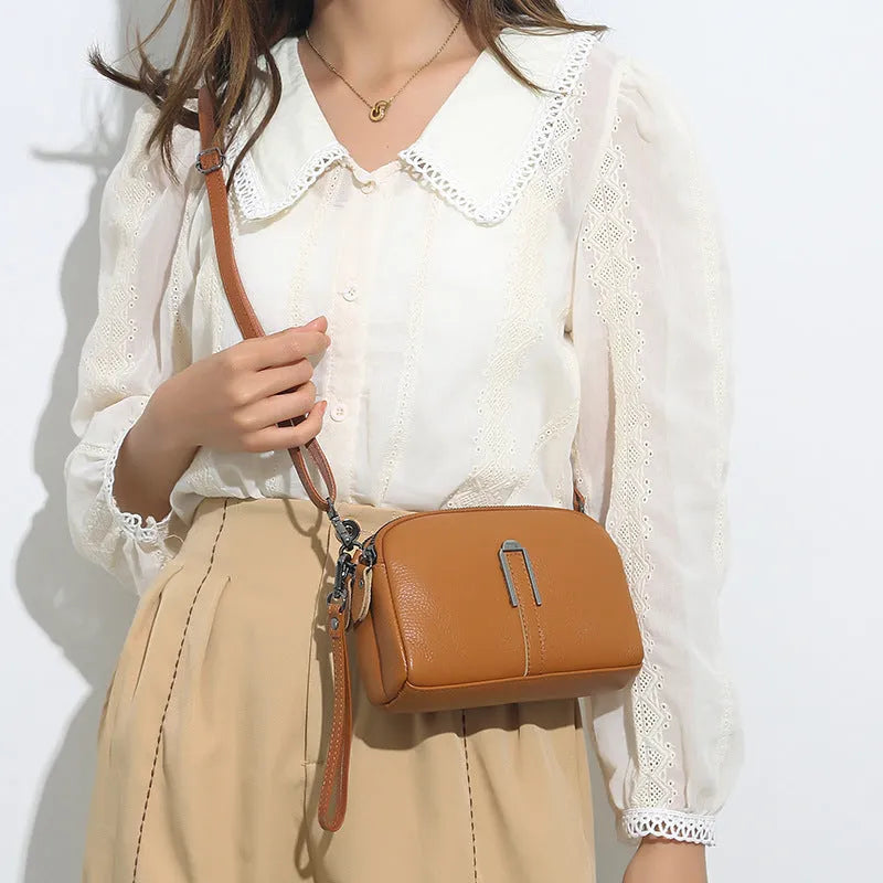 Genuine leather women's square shoulder bag in black, shown with dimensions 19cm by 13cm by 6cm.