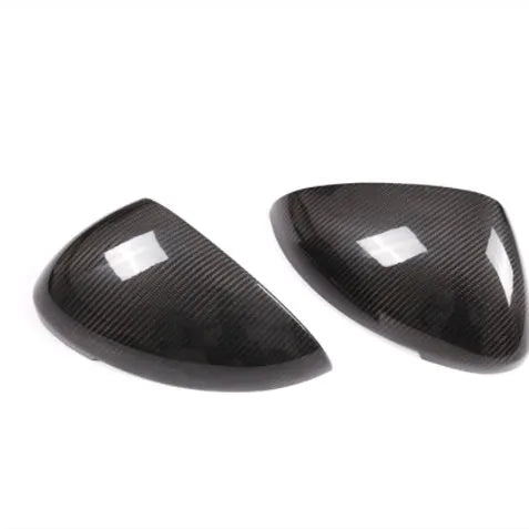 Carbon fibre rearview mirror covers for Porsche Macan with black finish and woven texture