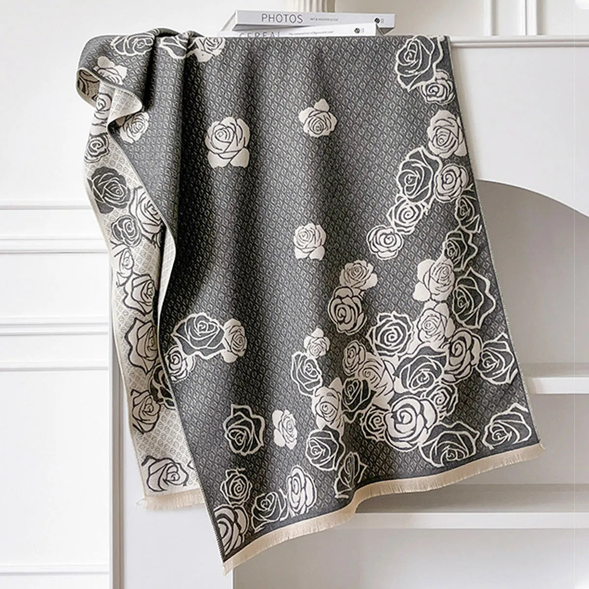 Long gray cashmere-like winter scarf with tassels laid flat showing its 185cm length