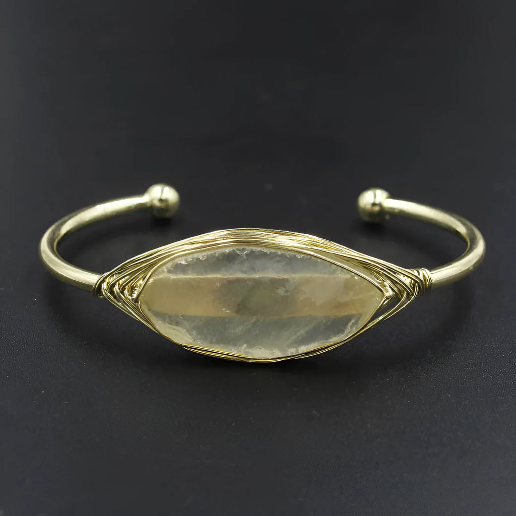 Natural raw gemstone winding crystal bracelet showing simple opening design and amorphous 8mm shape