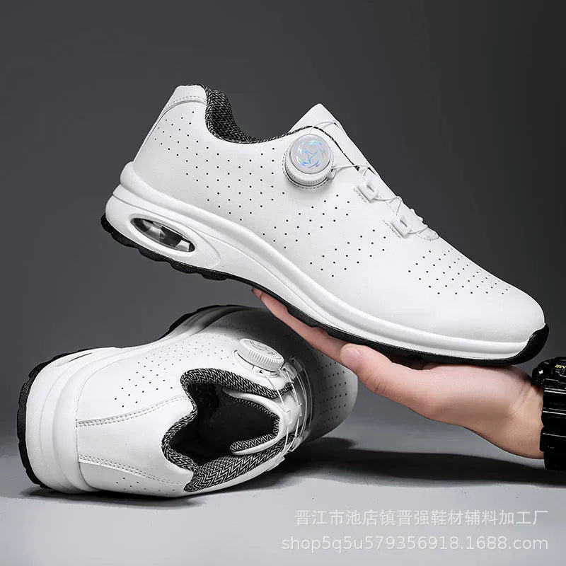 Low top tennis shoes in black with mesh upper, cross shoulder straps, and composite sole