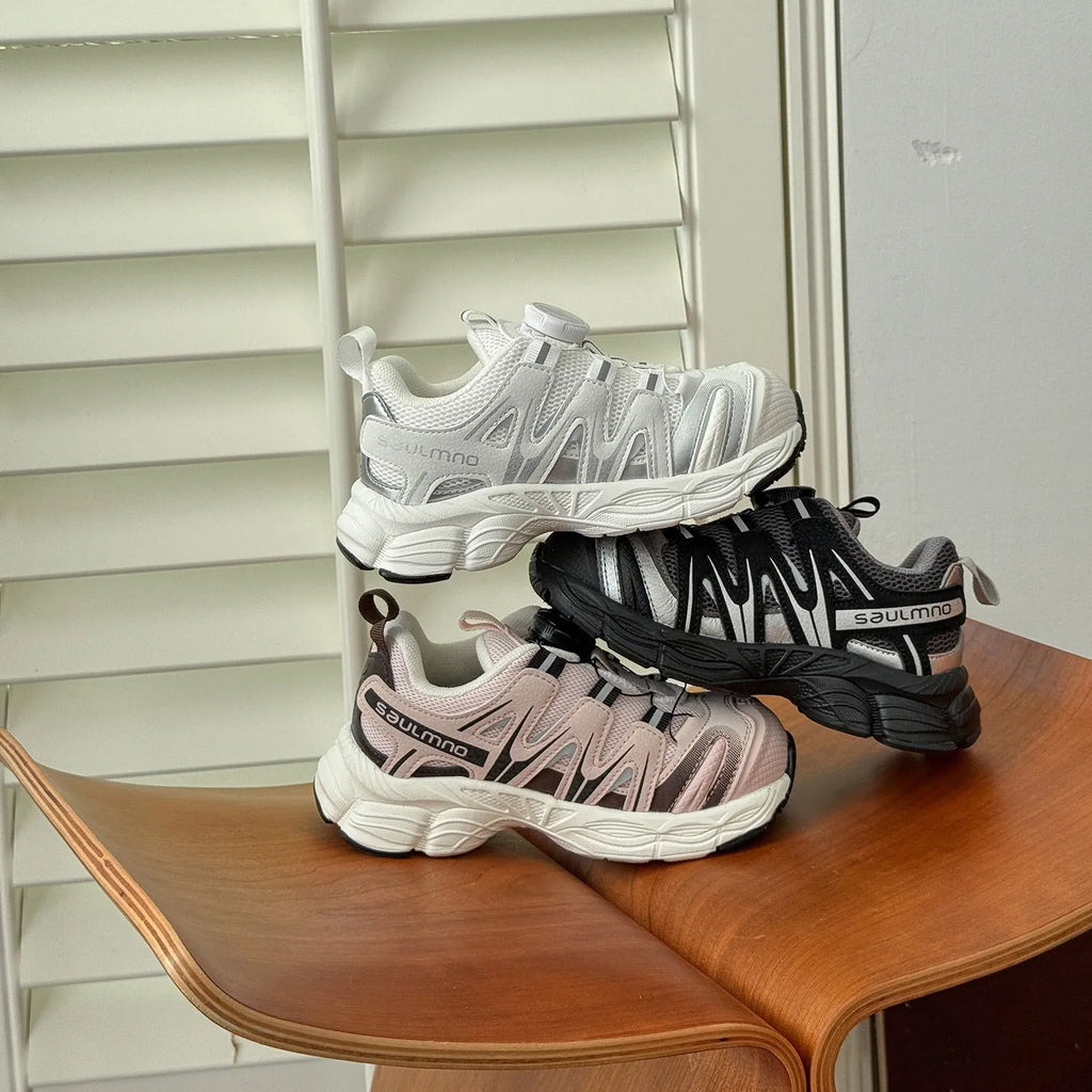 Girls casual trainers in beige with a breathable PU leather mesh upper, shown on a light background.