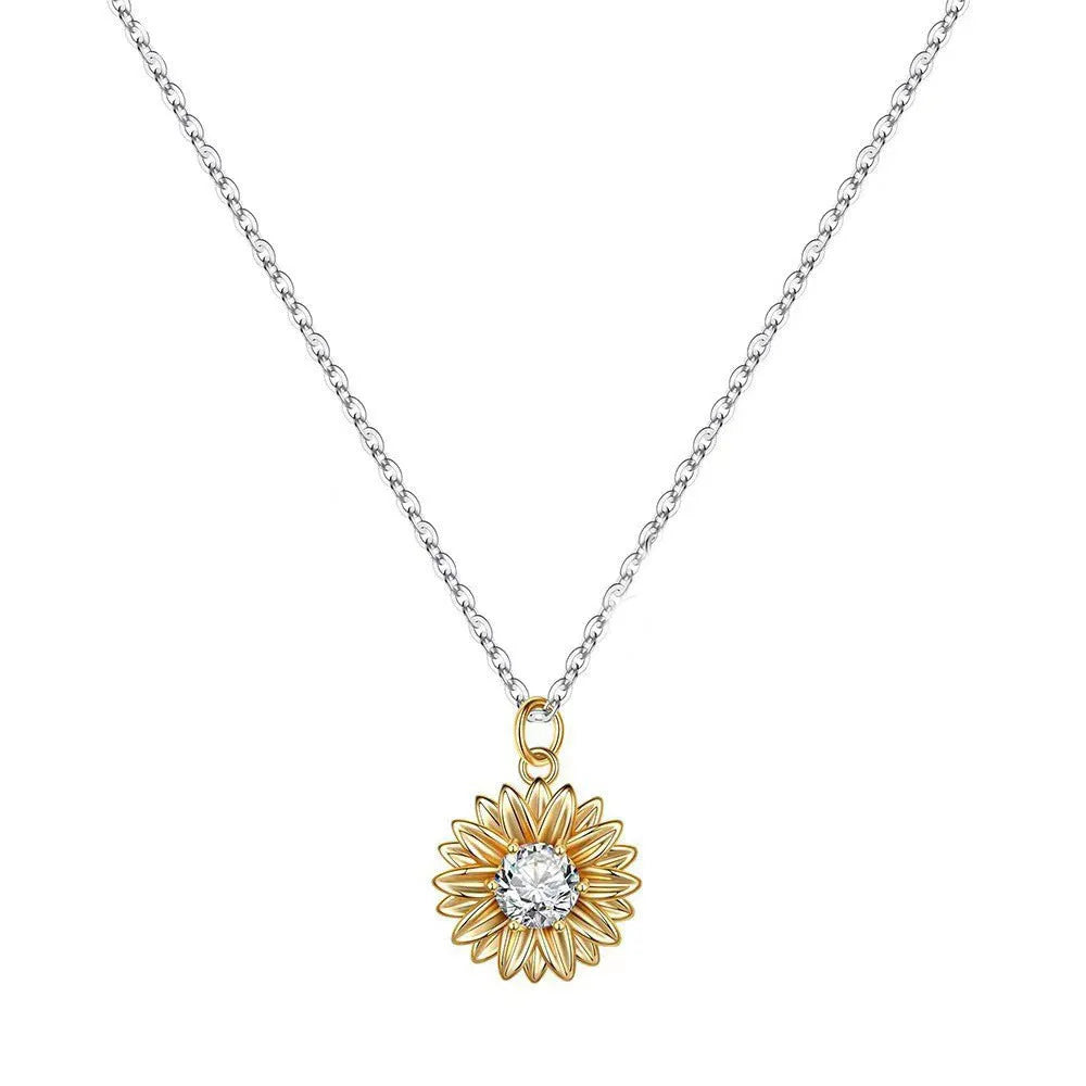 Women's sterling silver sunflower necklace with geometric pendant and adjustable cross chain.
