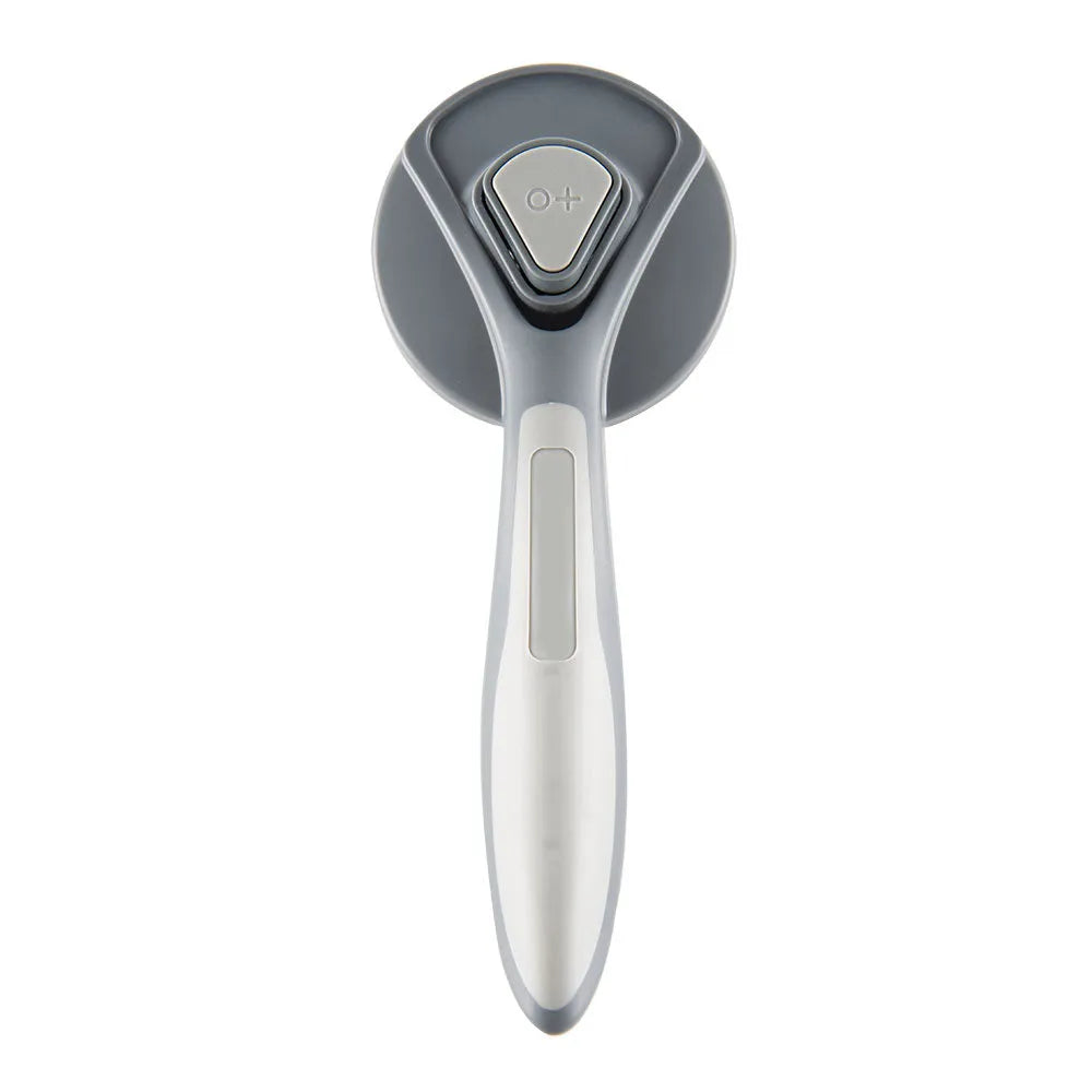 Grey self-cleaning slicker brush for pets with a non-slip handle and one-touch cleaning button.