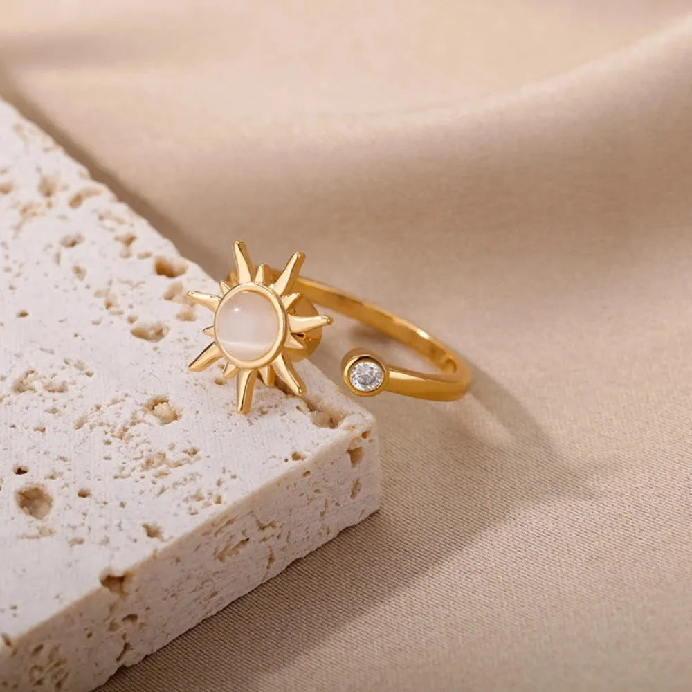 Gold and platinum electroplated copper rotatable ring with adjustable open mouth and geometric round shape
