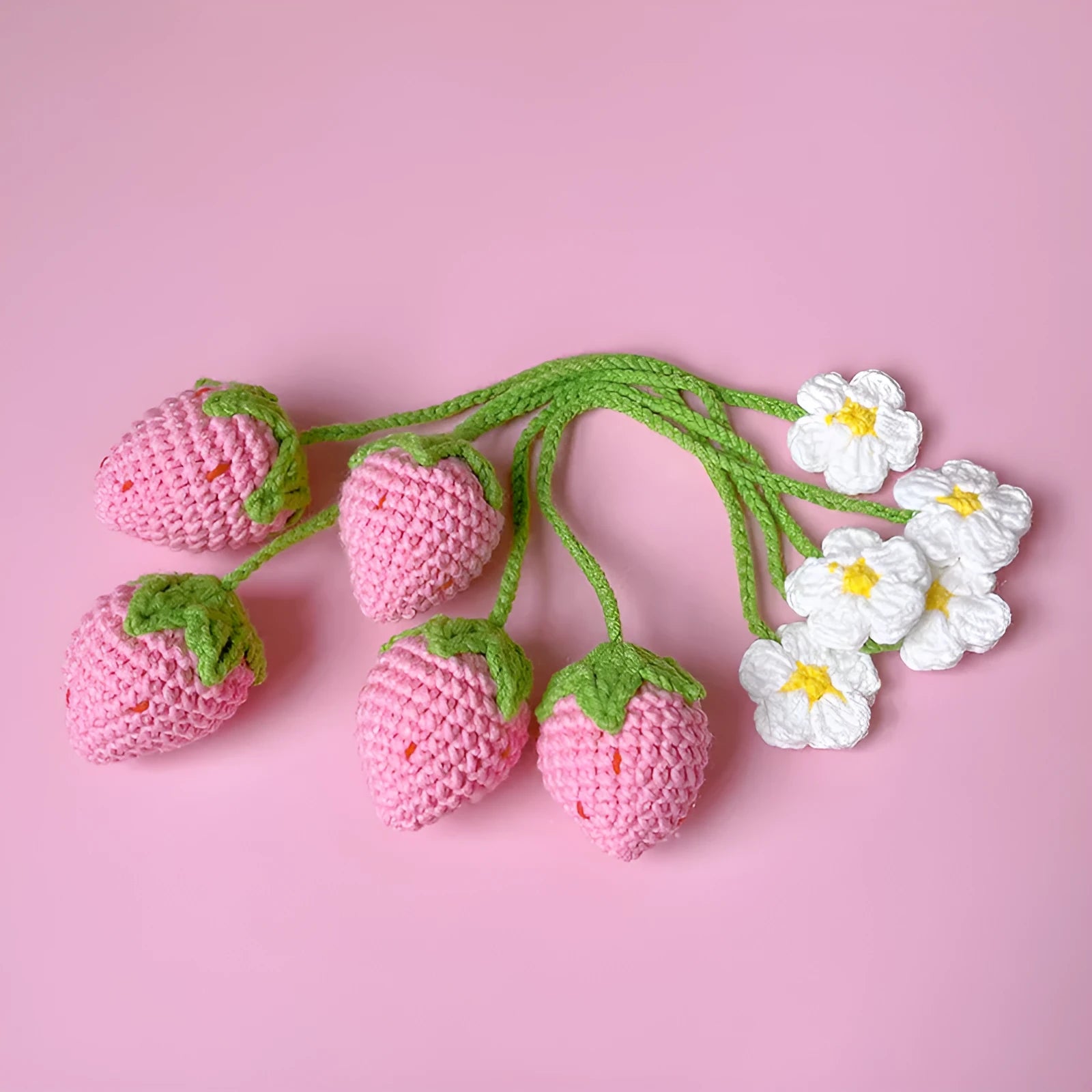 Knitted wool crochet woven strawberry pendant on a long cord, red and pink colour options.