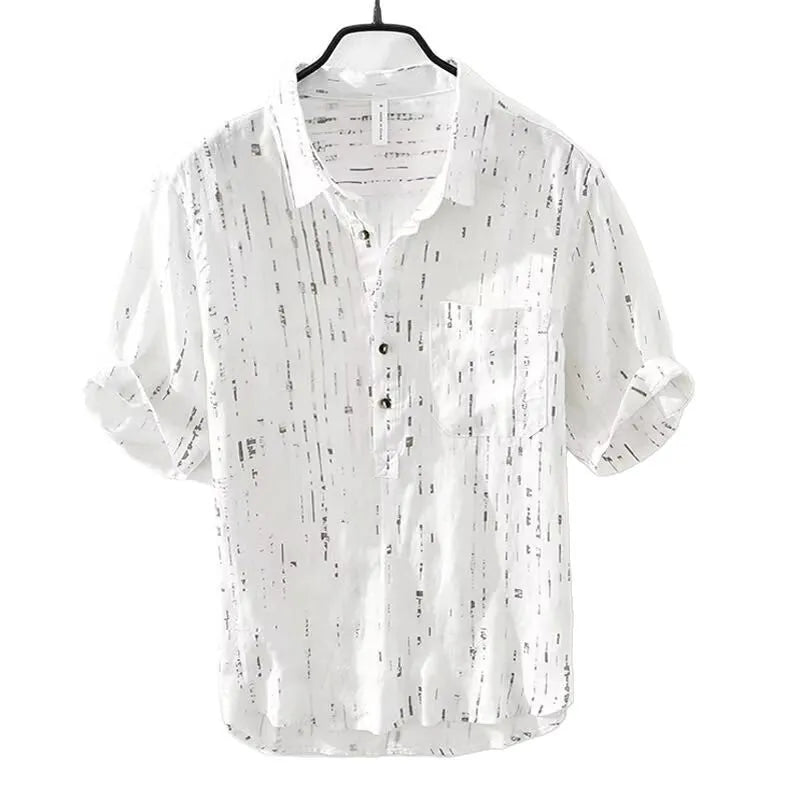 Men's loose-fit short-sleeve polo shirt cardigan in black, laid flat.