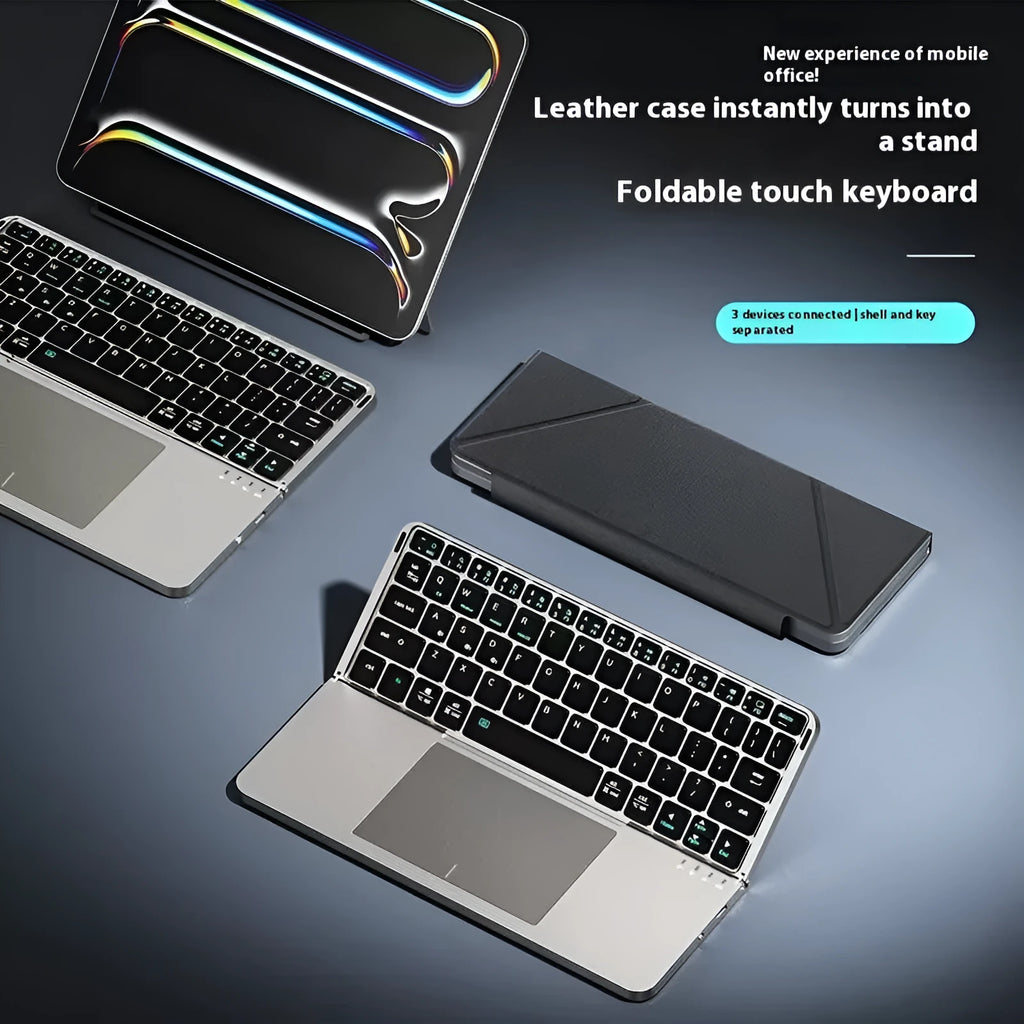 Grey wireless Bluetooth folding keyboard for mobile phones and tablets showing collapsed portable design