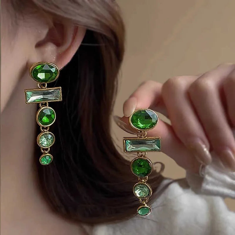 A pair of green gradient geometric Chinese style alloy earrings with inlaid zircon stones.