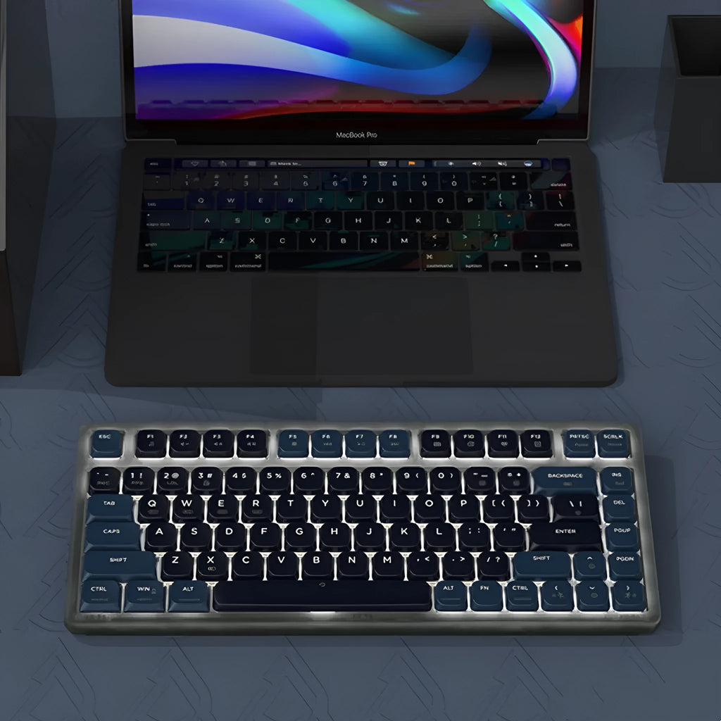 Ajazz AK832PRO green and tea coloured three-mode mechanical keyboard with RGB lighting on a desk.