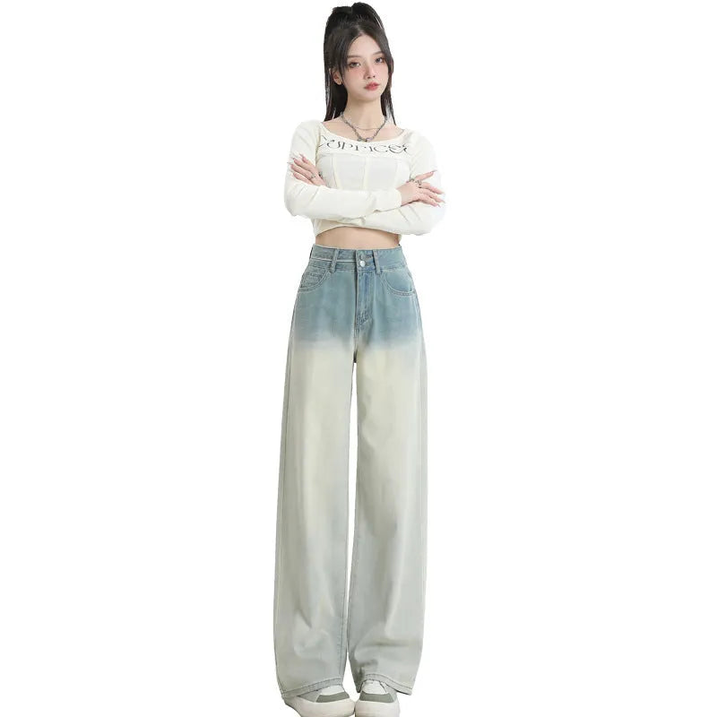 Women's gradient blue straight-leg denim trousers with wide leg design on hanger