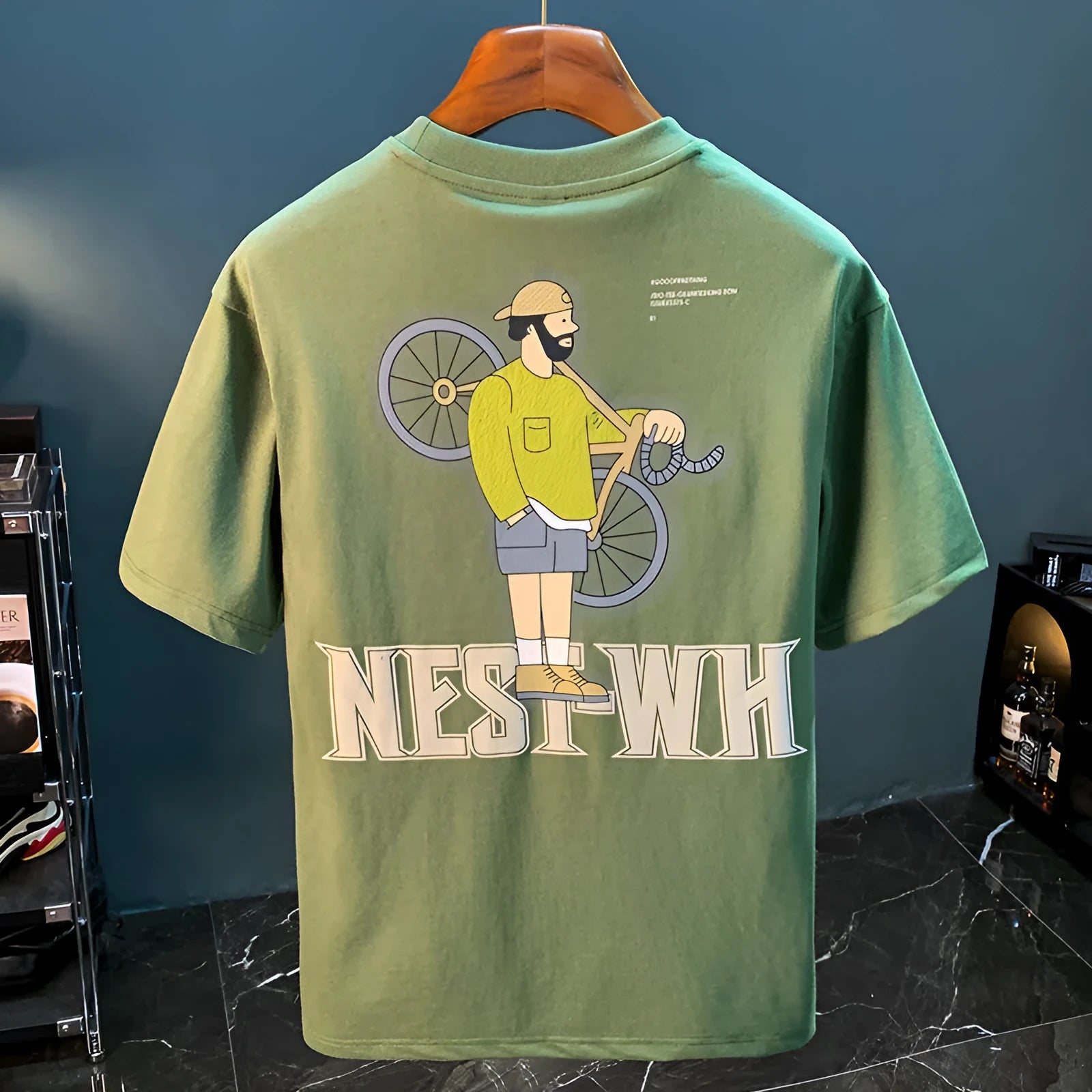 Green men's loose fit t-shirt with literary print design and short sleeves