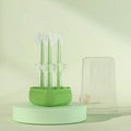 Purple pet toothbrush with flexible silicone head for cleaning cat and dog teeth